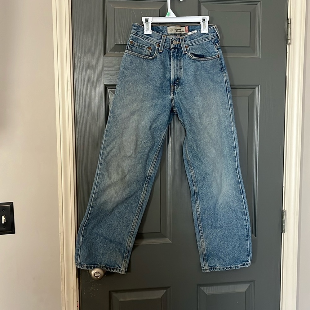 Levi’s Loose Straight 569 Regular 25X26 vintage, holes in back.